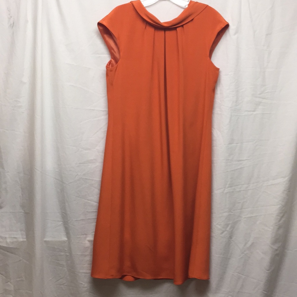 100%silk, lined sheath dress with back tie